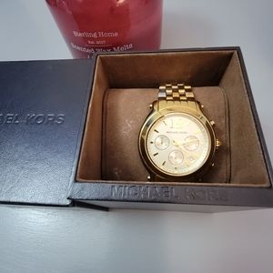 Michael Kors gold boyfriend watch in original box.